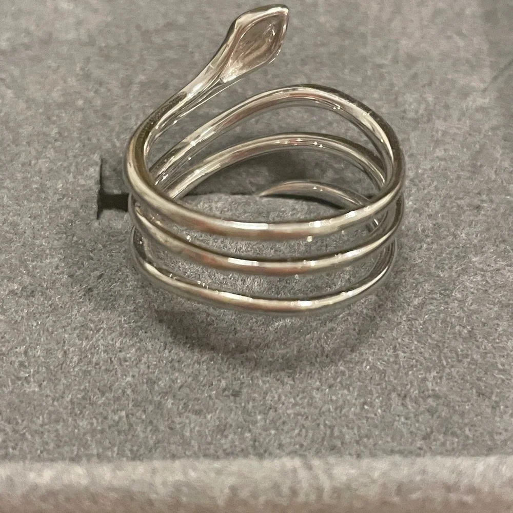 Anne Sisteron snake 14k white gold, .33 carats natural diamonds, .02 ruby size 6